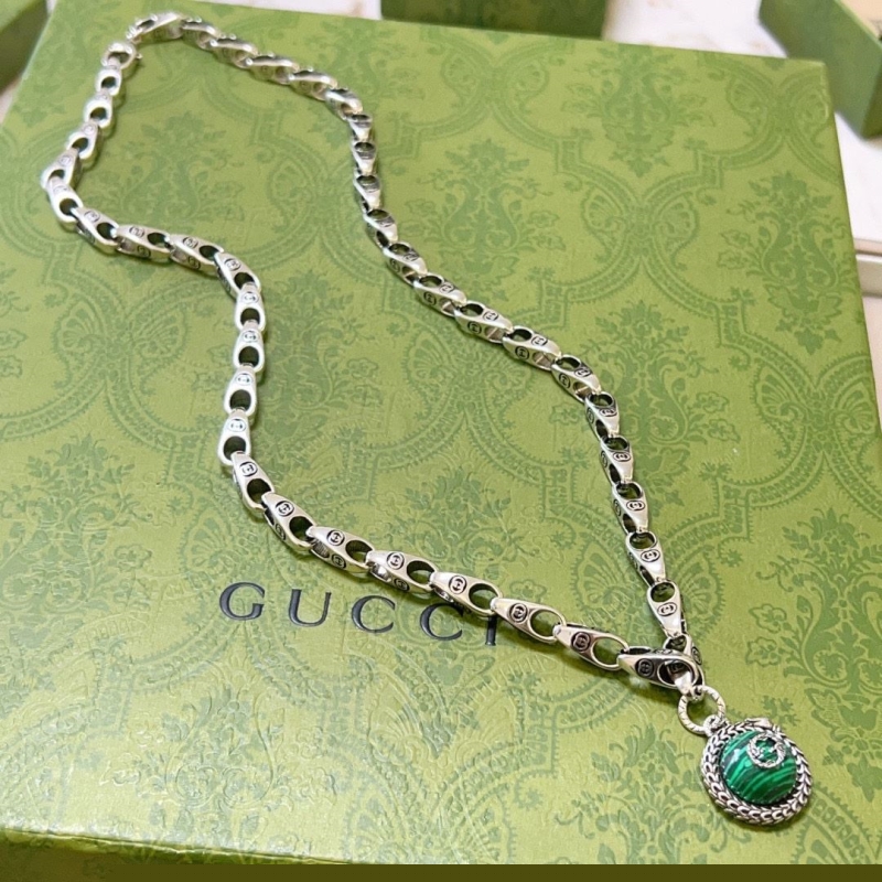 G*u*i necklaces
